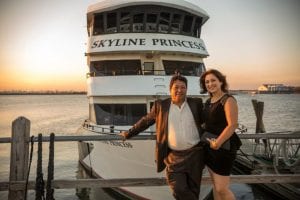 A couple aboard to enjoy an NYC Dinner Cruise