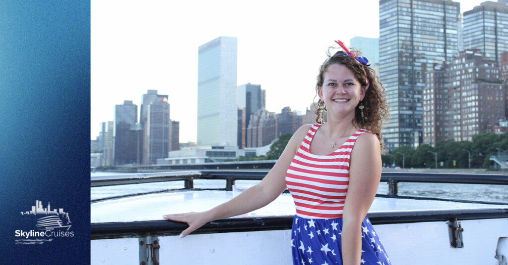 Woman in Fourth of July attire with New York City highrises behind her.